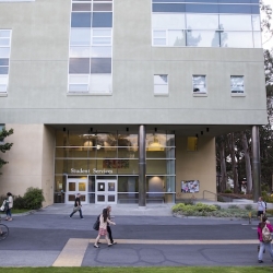 Student Services Building with students walking out front